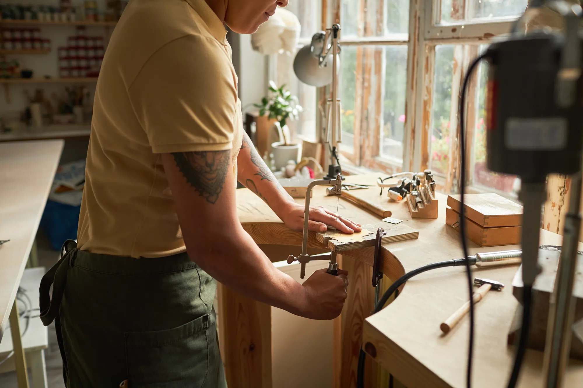 A woodworker crafting furniture by hand