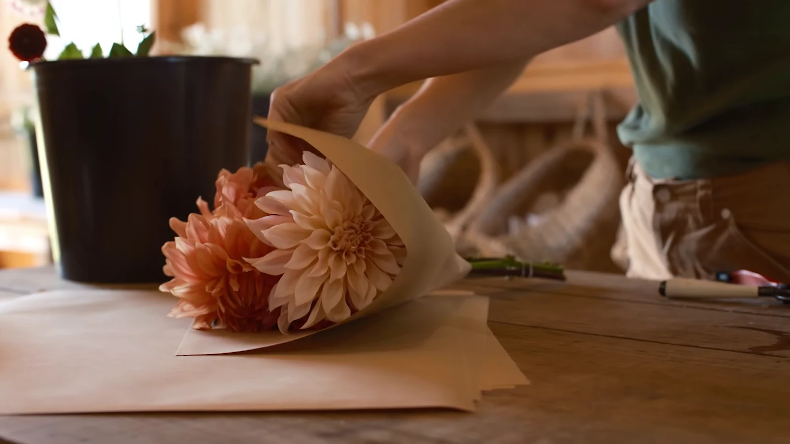 A florist arranging a bouquet